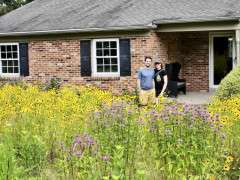 EVAN AND SARA 2024 0701 IMG 2534 Sara and Evan behind front meadow copy image